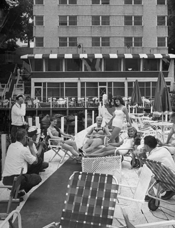 View of The Edgewater Hotel in the 1950s - People Hanging out on the pier