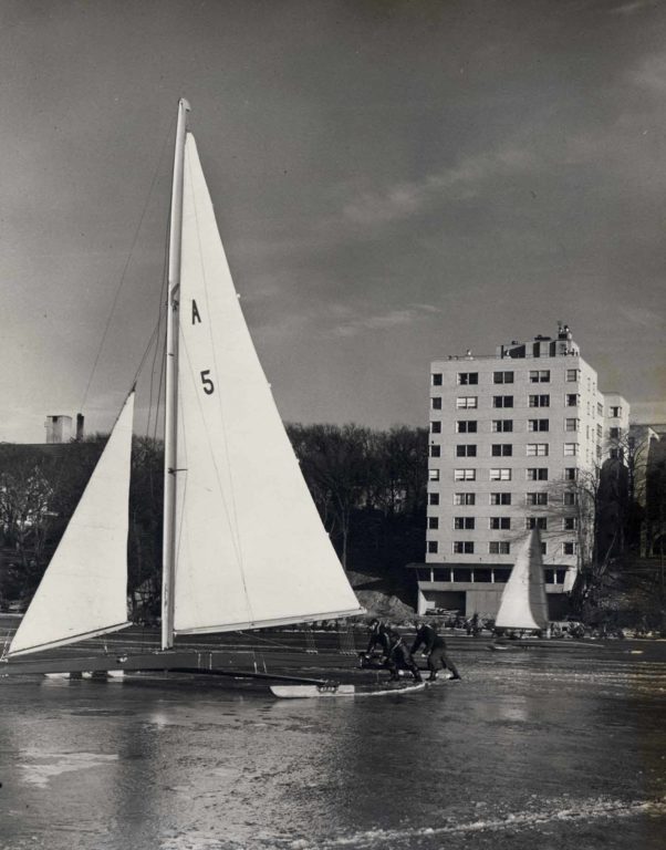 View of The Edgewater Hotel in the 1950s with a Boat