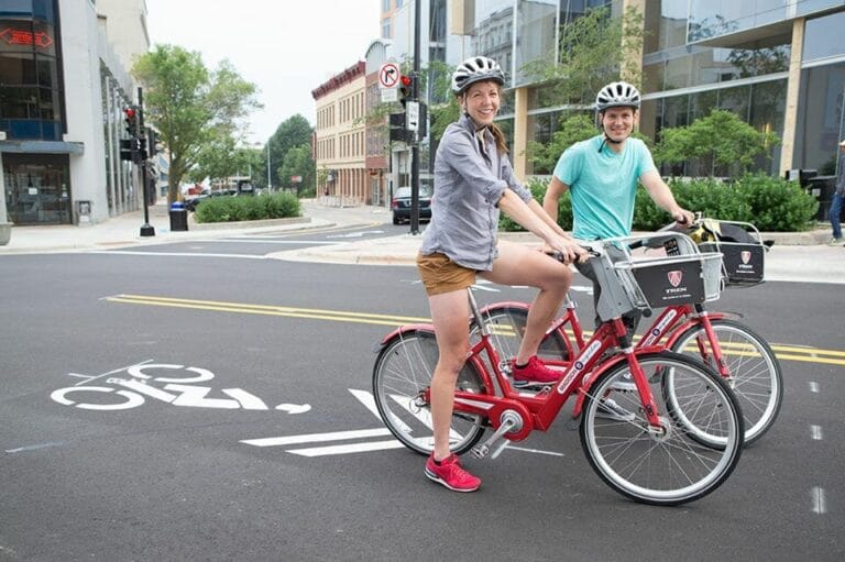 Two People on Bikes
