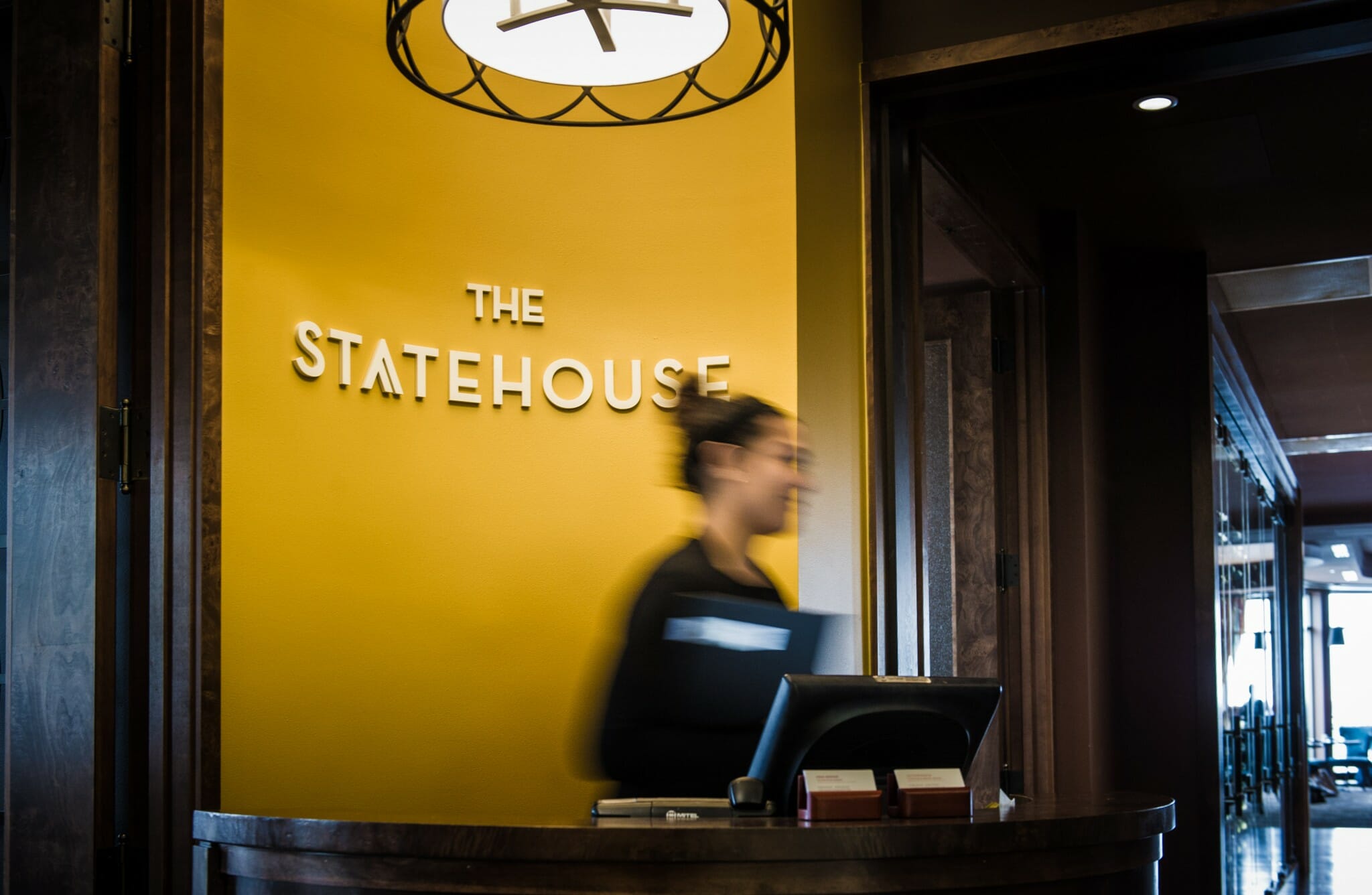 Person at Front Desk at The Statehouse