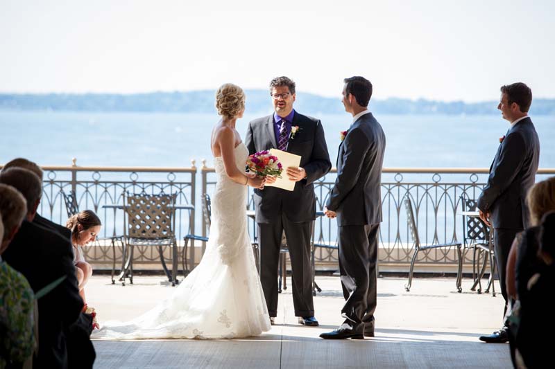 Bride and Groom Facing Each Other In Front of Officiant