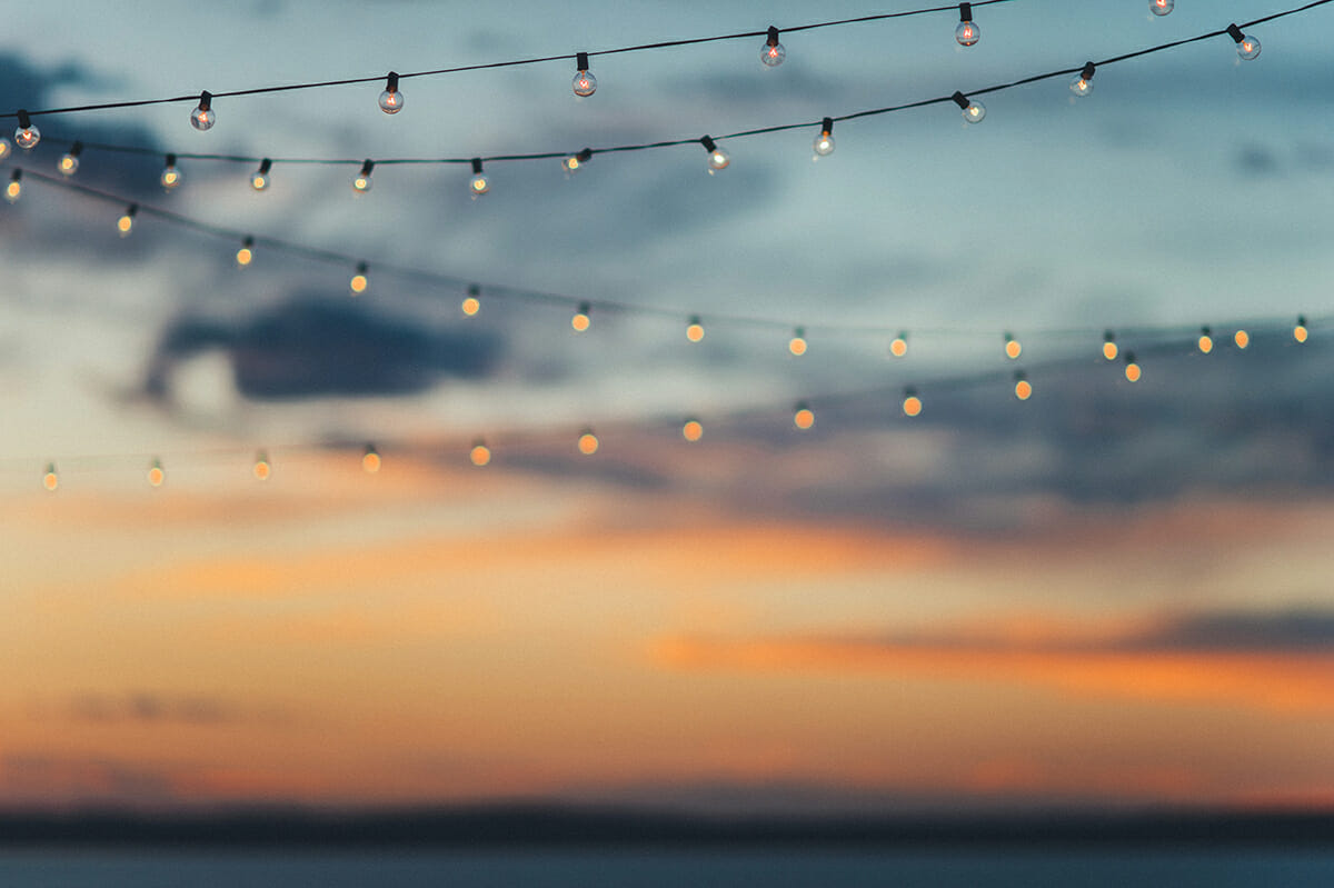 String Lights In Front of Sunset