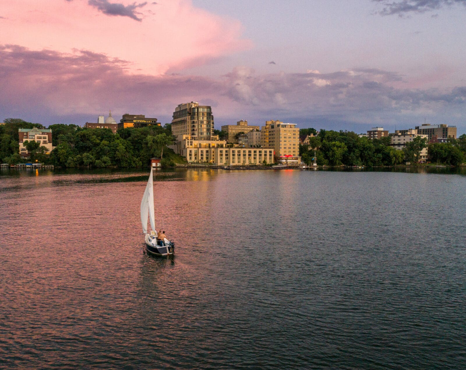 The Edgewater at Sunset with a Boat